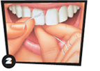 Illustration of fingers flossing between top teeth